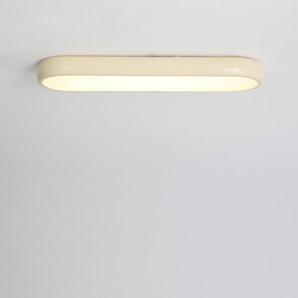 Plafonnier LED Ovale Ultra-Plat Blanc – vue de profil fond gris