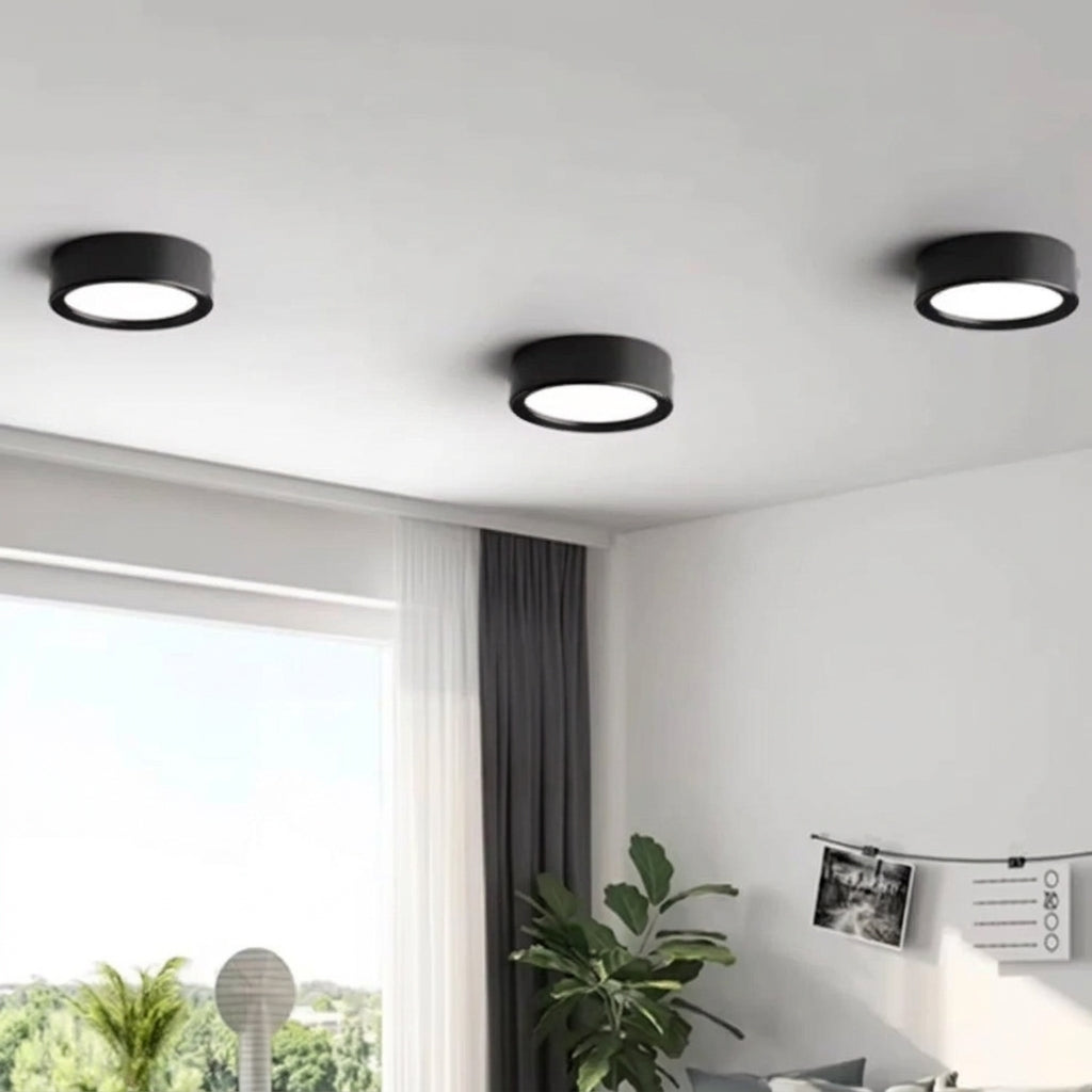 Plafonnier LED saillie noir – ambiance salon, 3 spots au plafond